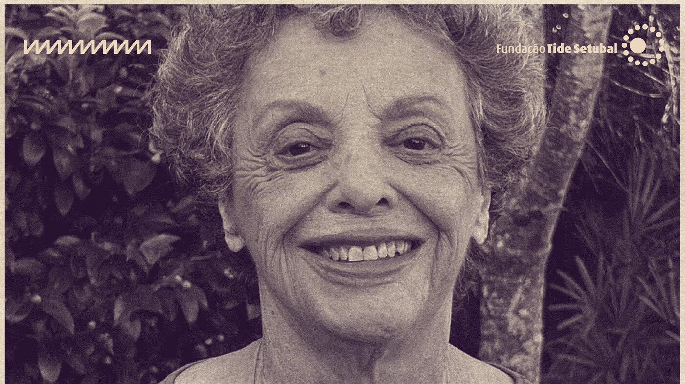 Imagem de Branca Moreira Alves. Ela é uma mulher branca, que tem cabelos curtos e grisalhos. A foto tem filtro na cor roxa e os logos da Rádio Novelo e da Fundação Tide Setubal.